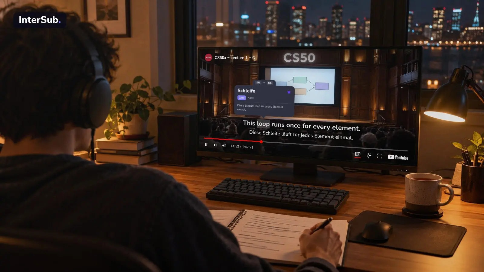 A student in headphones watches a CS50 lecture on YouTube on a desktop monitor, with English and German subtitles; the InterSub dictionary shows “loop: Schleife”