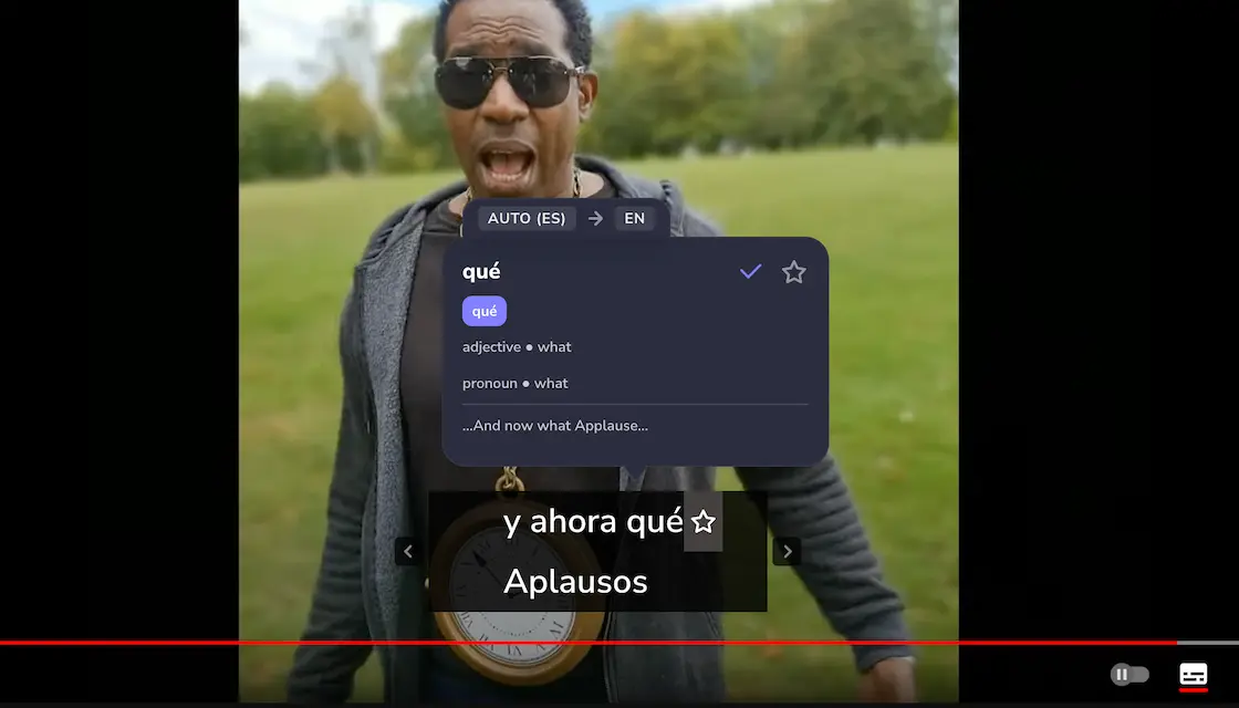 InterSub on a YouTube video: Spanish and English subtitles with the pop-up dictionary open